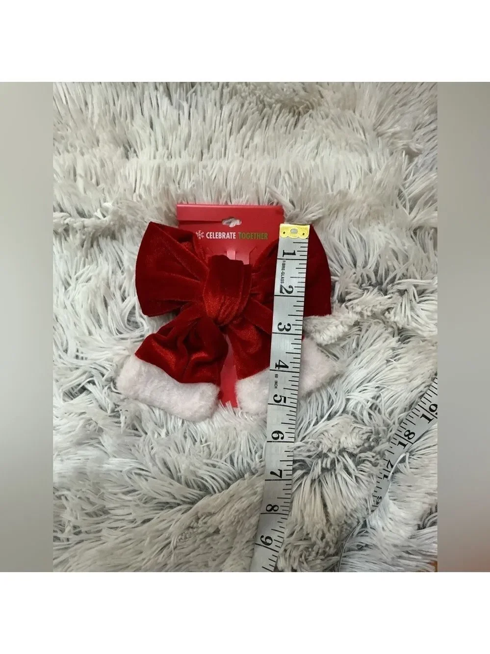 Celebrate Together oversized red velvet bow hair clip with white trim